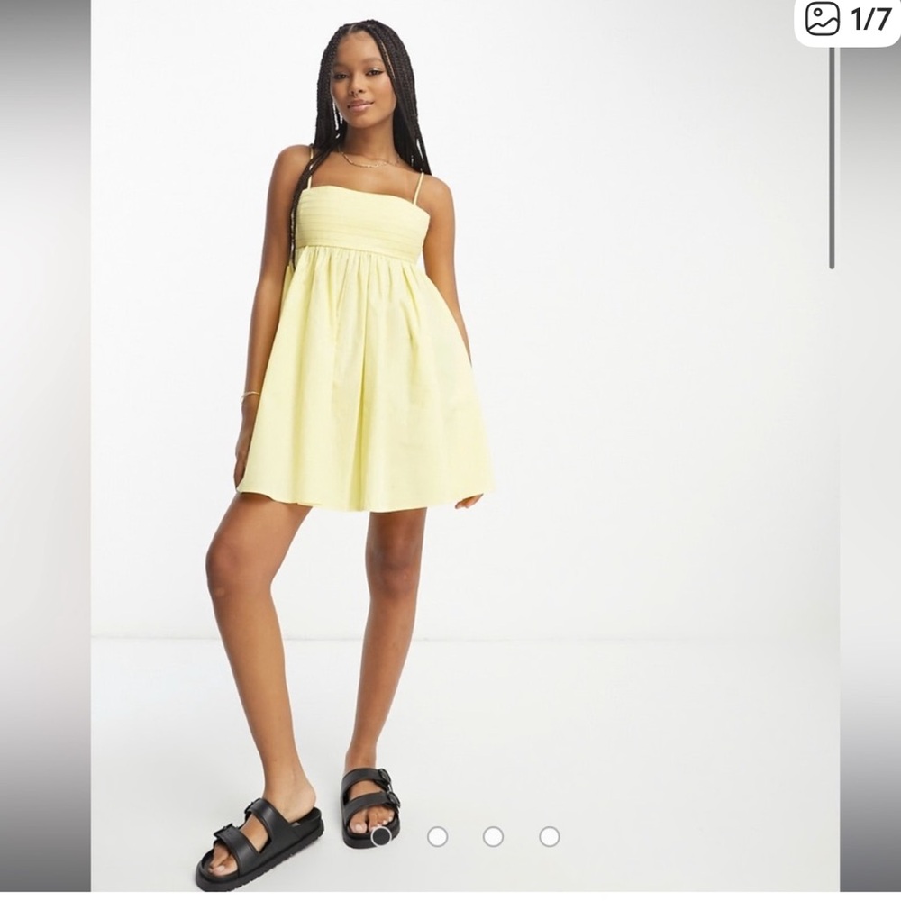 ASOS DESIGN cotton pleat bust babydoll mini sundress in light yellow